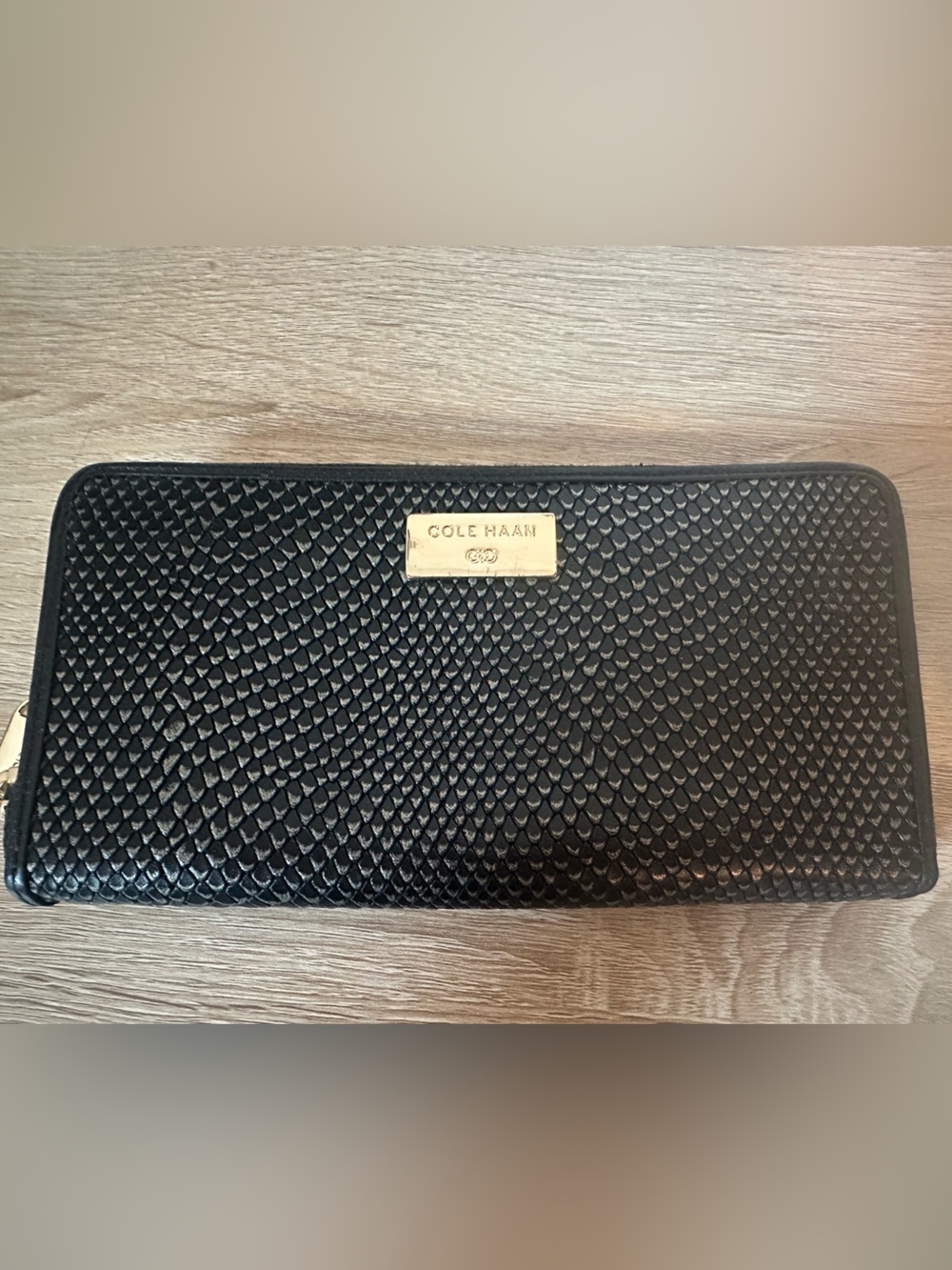 Cole Haan Black Woven Zip-Around Wallet with Gold Plaque